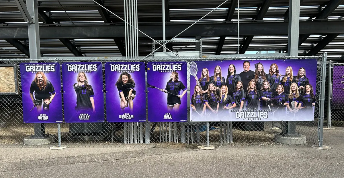 four individual senior lacrosse banners and the team composite banner hanging at Rocky Mountain High School Meridian Idaho