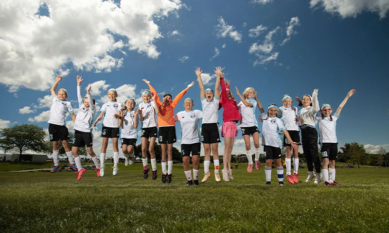 Idaho youth soccer team celebrating at a tournament at Simplot Sports Complex, Boise