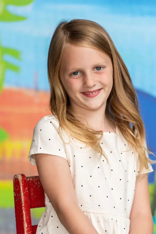 School photo day close-up portrait of elementary girl with natural smile - Treasure Valley school photography