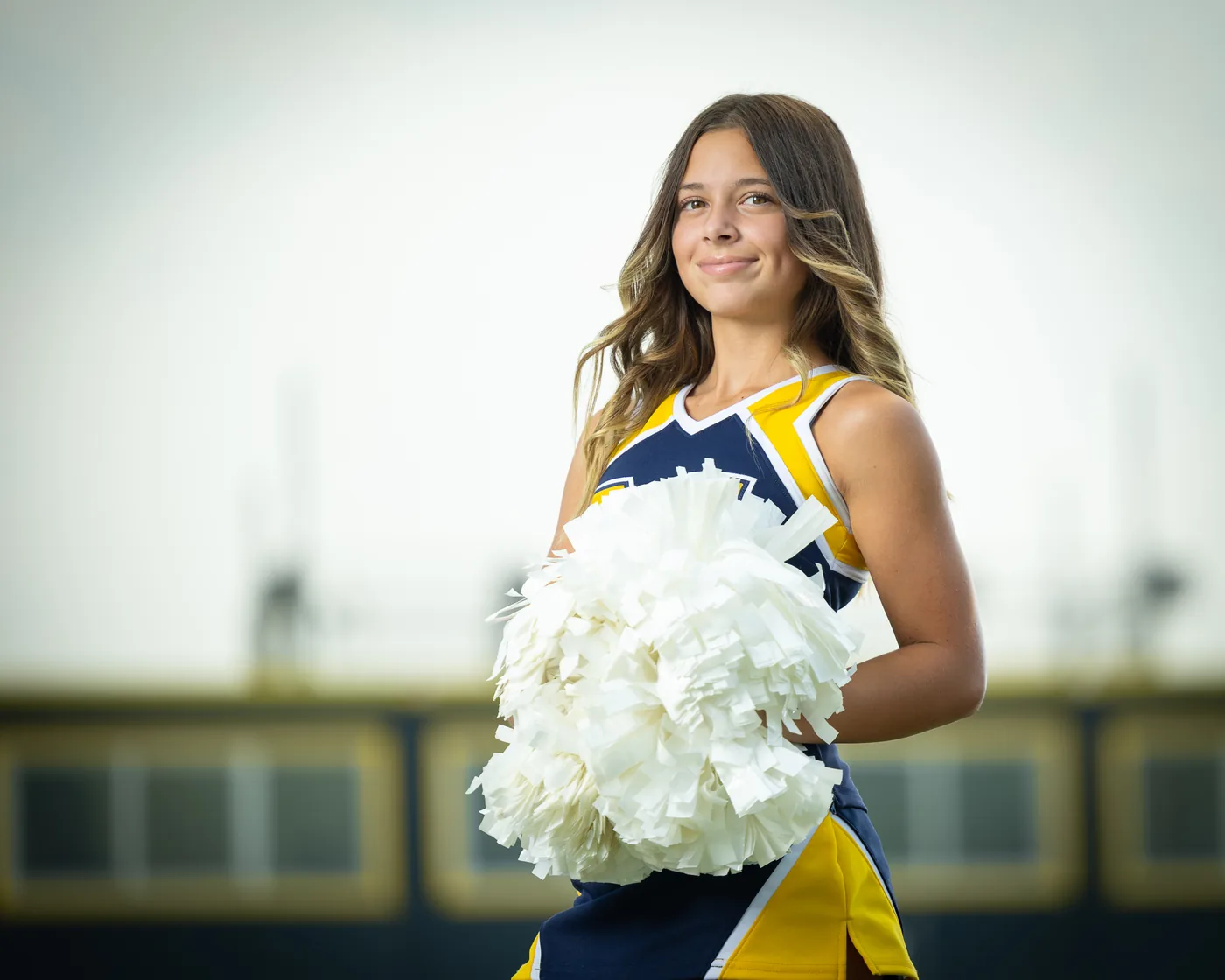 Meridian High School cheerleader portrait with poms Meridian Idaho
