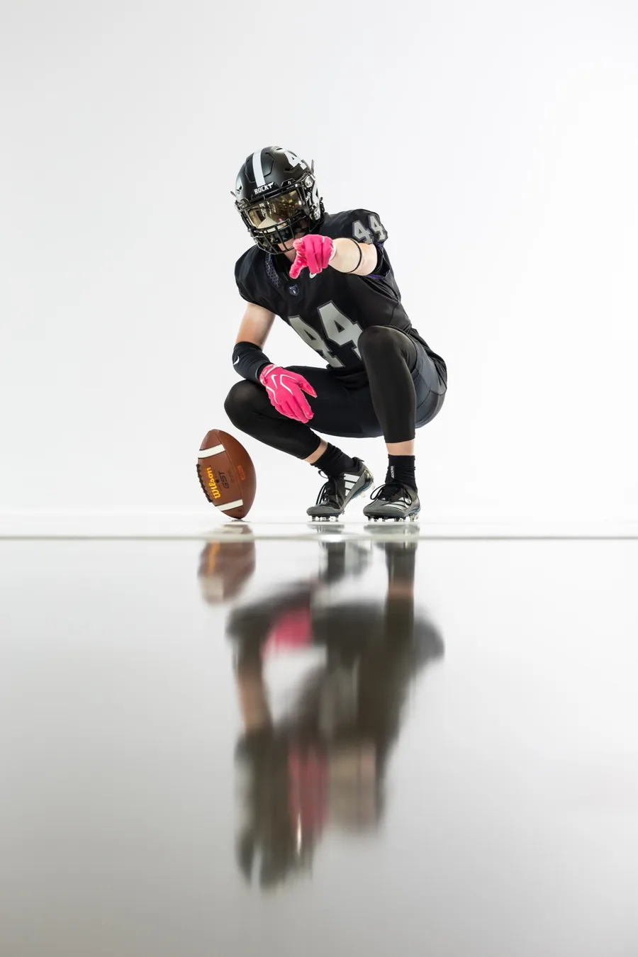 Rocky Mountain High School senior football portrait with mirror reflection Meridian Idaho