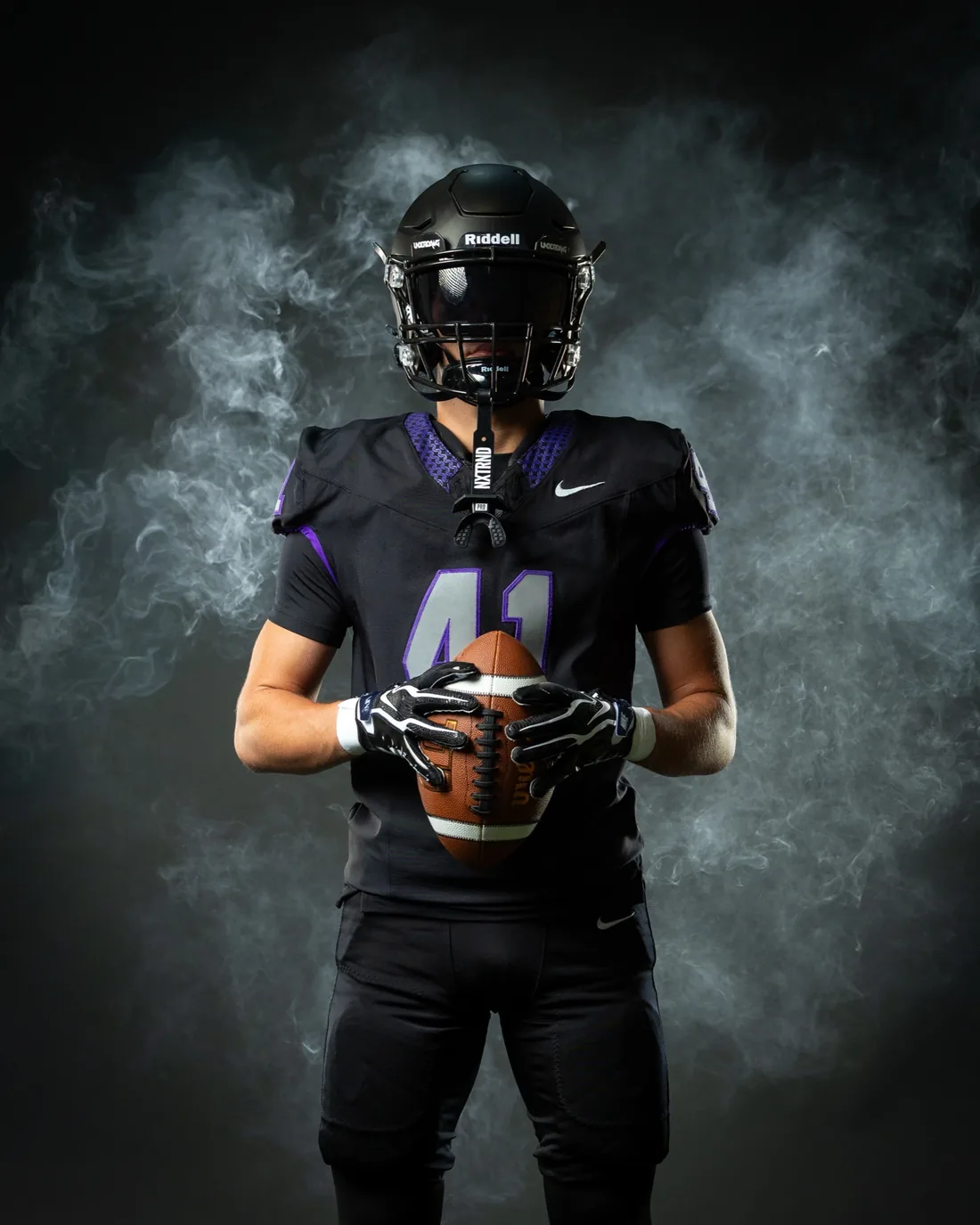 Rocky Mountain High School football media day portrait with smoke Meridian Idaho