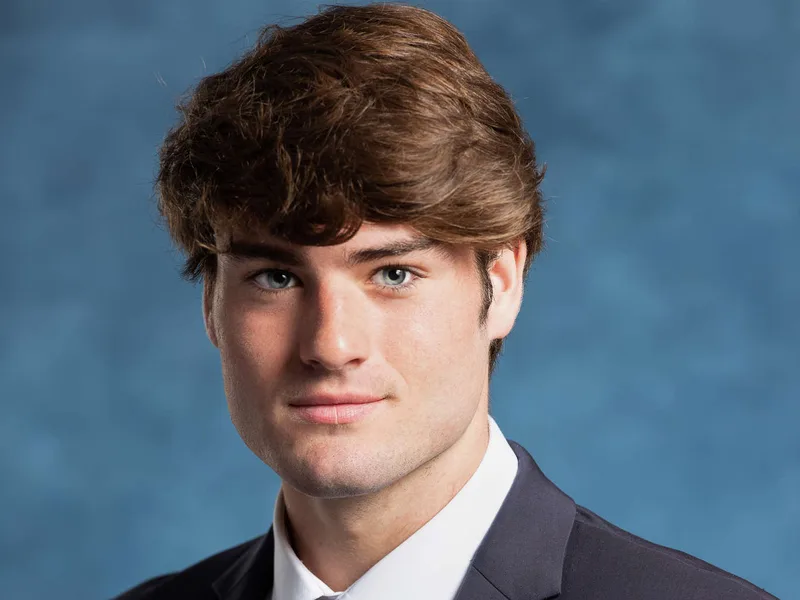 Senior yearbook headshot in suit with professional studio lighting Meridian Idaho
