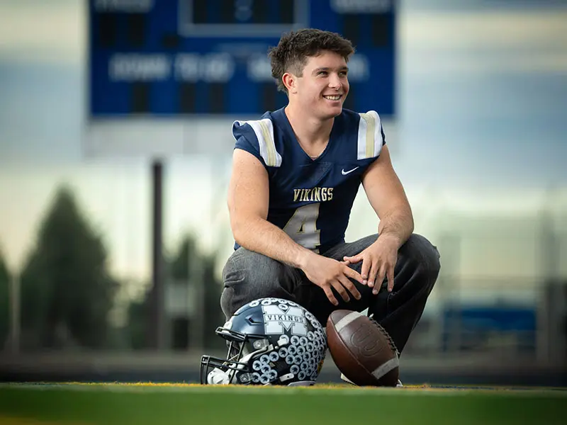 Senior athlete portrait with equipment