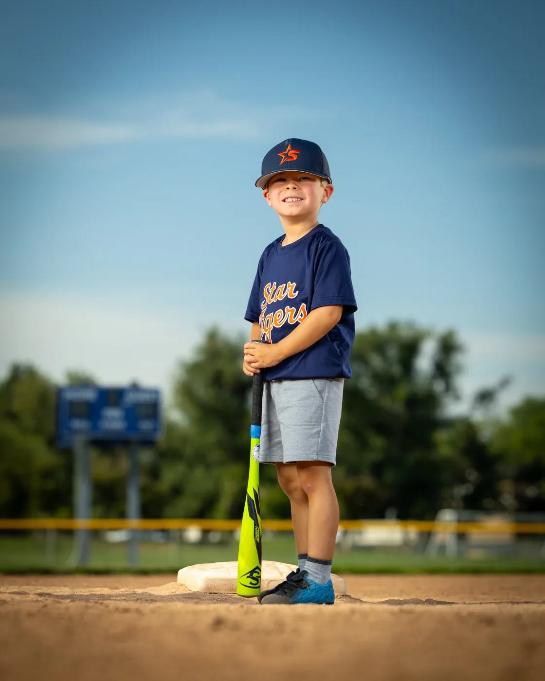 Young Star Tigers baseball player standing on base with his bat, Star Idaho