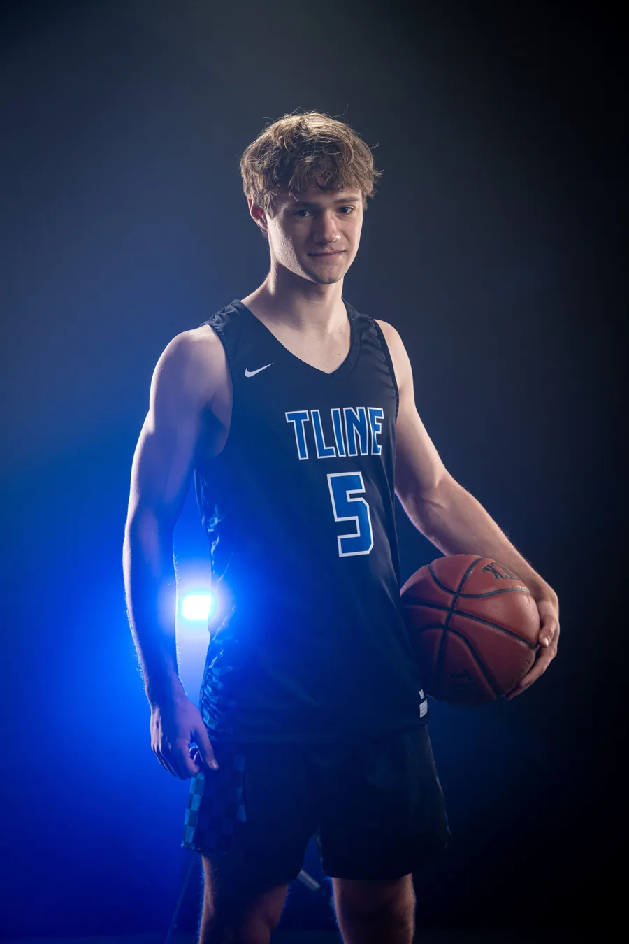 Timberline High School basketball player portrait with blue studio lighting Boise Idaho
